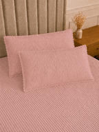 Kit cobre-leito matelassê rosa dobrado com porta-travesseiros (2 unidades)